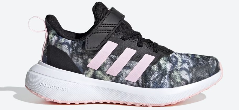 black and grey running shoe with pink stripes