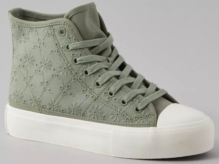 green and white high top shoe