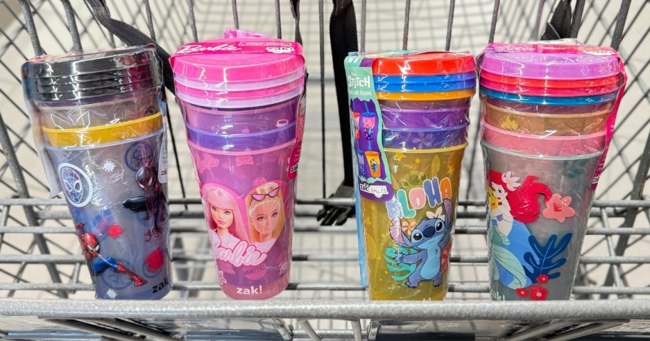 packs of different kid's character cups in a shopping cart