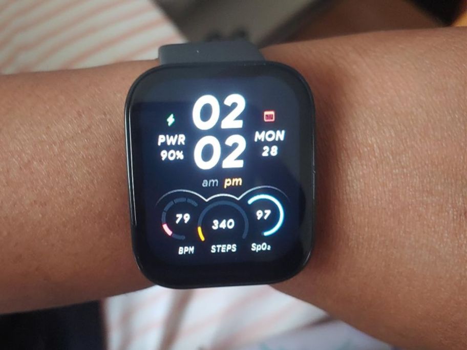 Arm wearing an Amazfit Bip 5 smartwatch