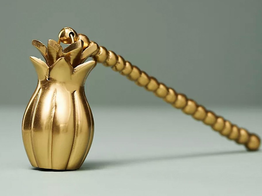 gold pineapple candle snuffer