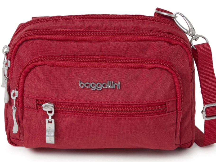red Baggallini bag with several zipper pockets
