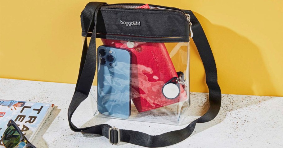 crossbody baggallini with phone and other items inside