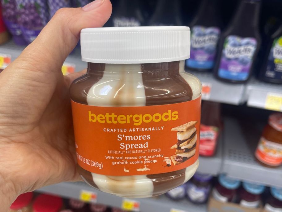 hand holding bettergoods S'mores Spread 13oz in store
