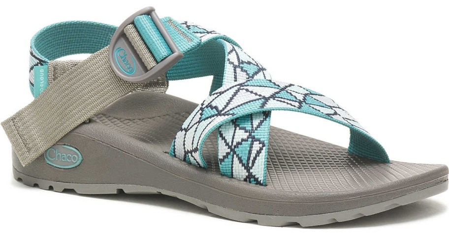 women's sandal with teal, grey, white design straps and grey sole