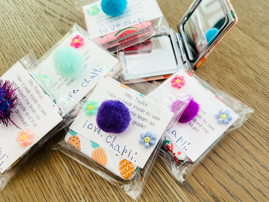 compact mirror teacher gift idea with notes on wood table