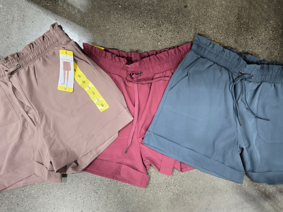 women's danskin shorts in tan, pink, and blue