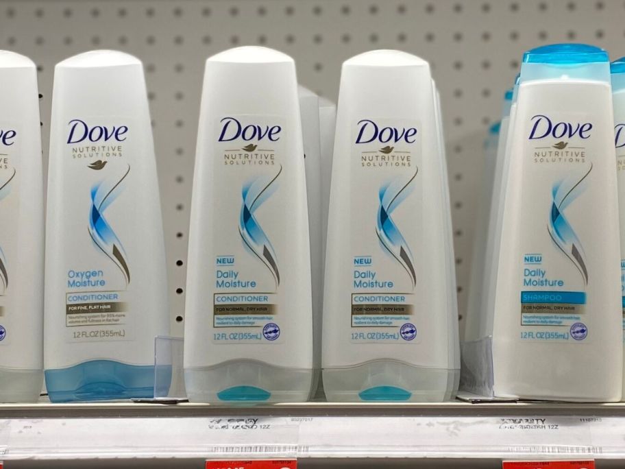 dove shampoo and conditioner bottles on store shelf