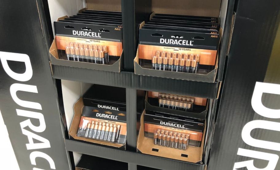 a store display with duracell AA and AAA battery packs