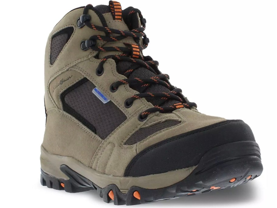 tan and black eddie bauer hiking boots stock image