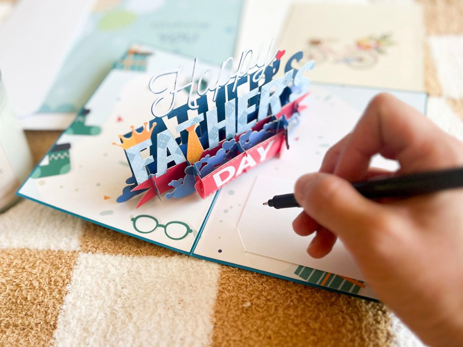 hand writing in fathers day pop up card