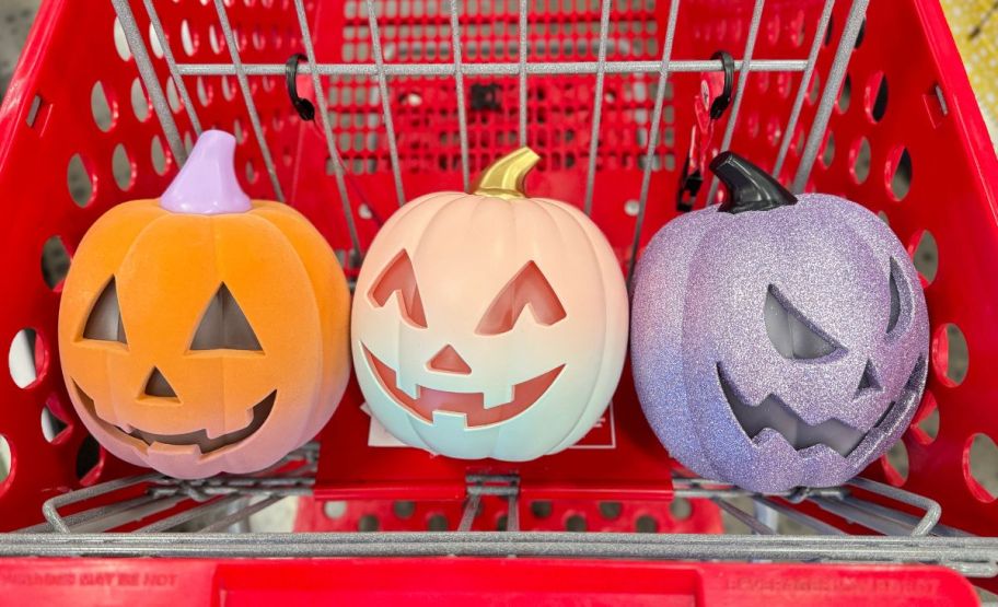 3 plastic flocked LED jack o lanterns in a target cart