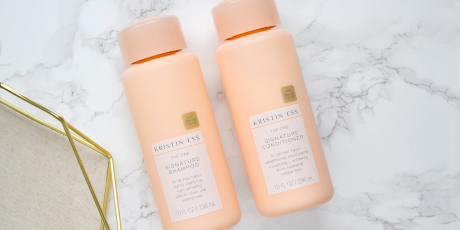 kristin ess shampoo and conditioner bottles 