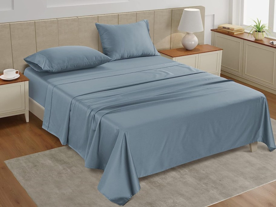 light blue sheets on bed