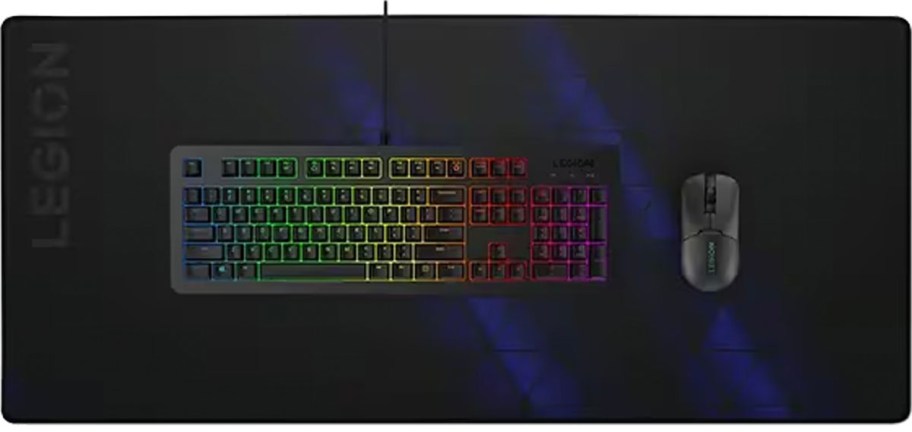 black and blue xxl mouse pad with keyboard and mouse on top 