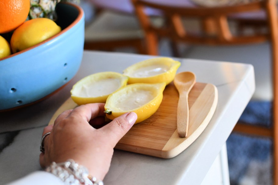 lemon fruit sorbet in a lemon cup on the counter