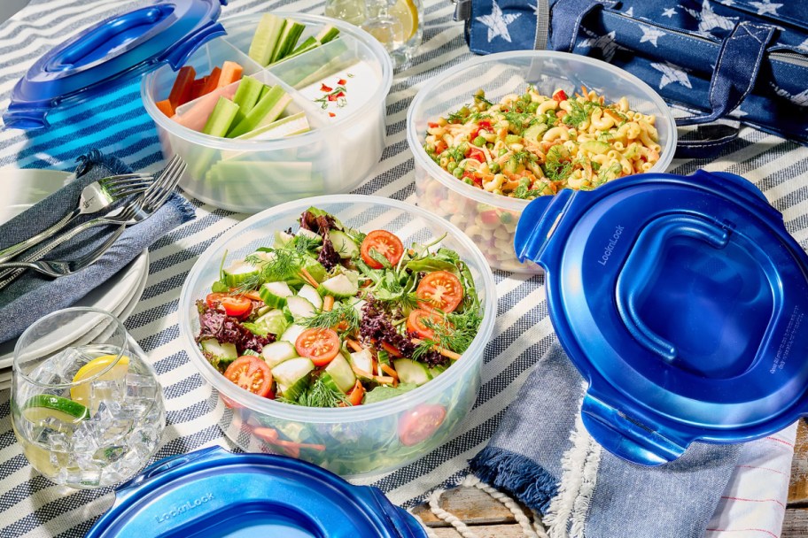 blue lid storage containers with food in them