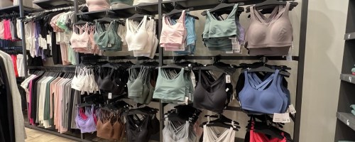 lululemon sports bras hanging in store