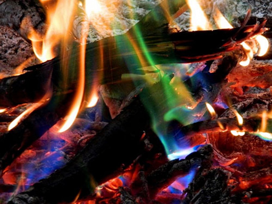 colorful fire burning with wood pieces 