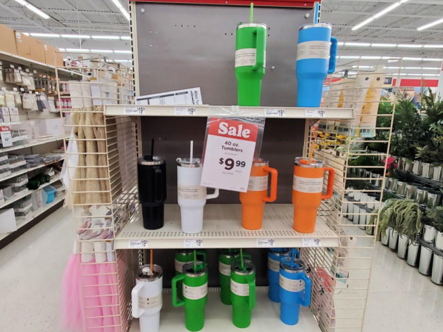 colorful tumblers sale display inside a michaels store