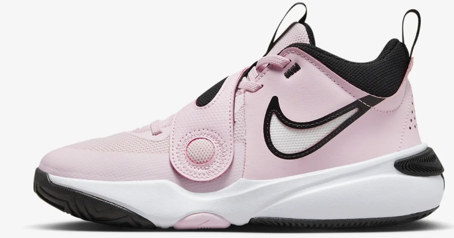 pink, white and black kid's Nike shoe
