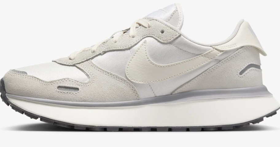 white and grey Nike women's shoe