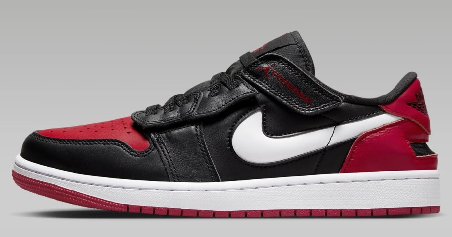 black, white and red men's Nike Air Jordan low's