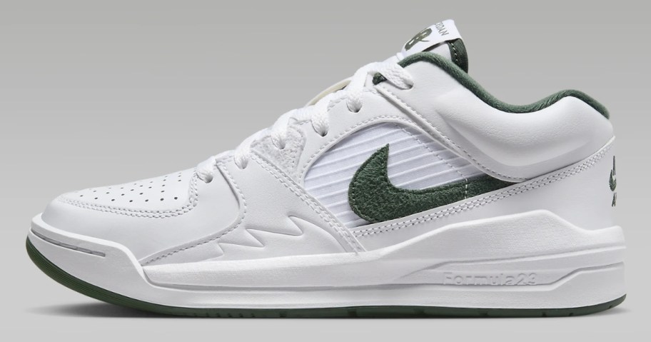mostly white with green accents women's Nike Jordan shoe