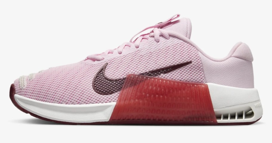 pink, red and black women's Nike shoe