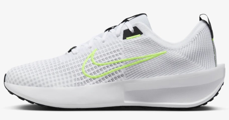 white and yellow men's Nike running shoe