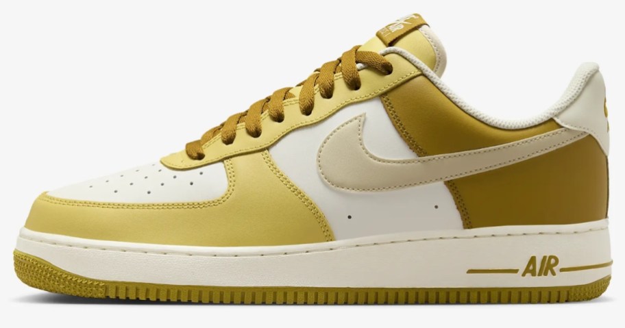 yellow, gold and white men's Nike shoe