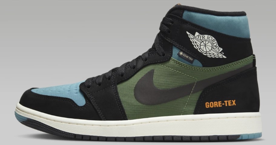 green, black and blue adults Nike Jordan high top shoe