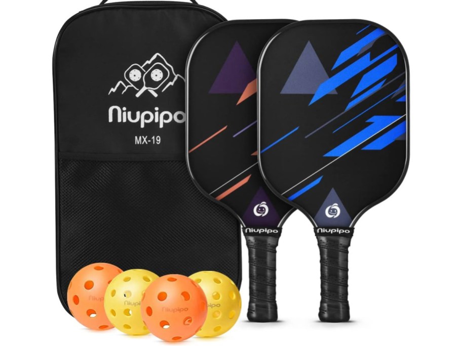 two pickleball boards in black and blue and red with balls and bag