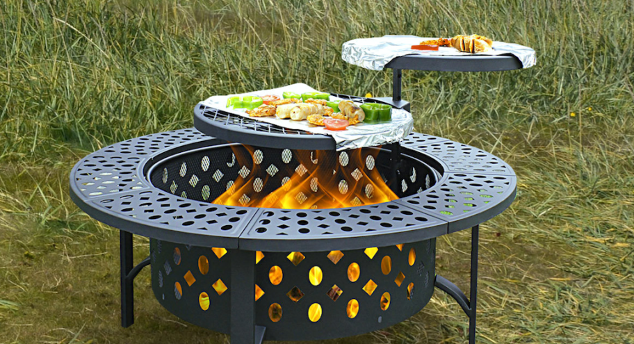 outdoor fire pit with food cooking 