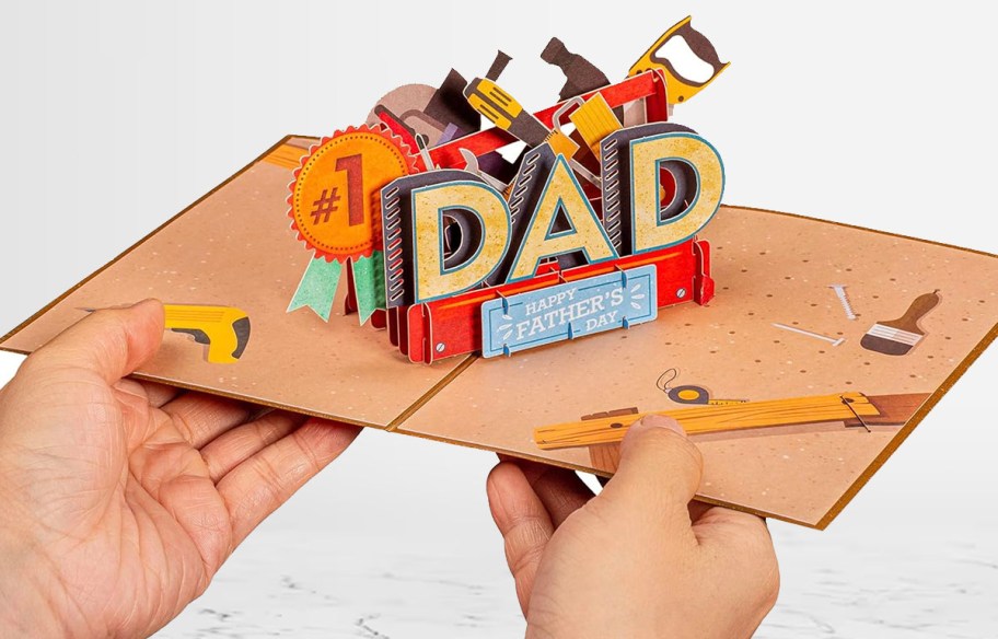 hands holding pop up toolbox fathers day card