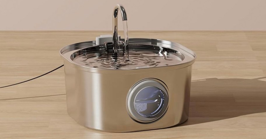 stainless steel water fountain with water coming out