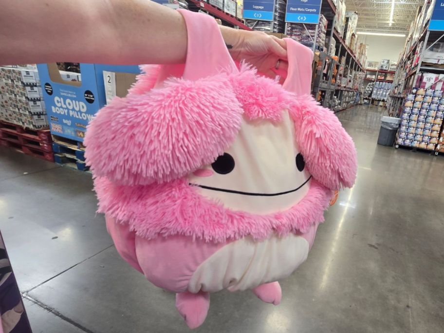 Squishmallows Brina The Pink Bigfoot Deluxe Kids Costume in hand in store