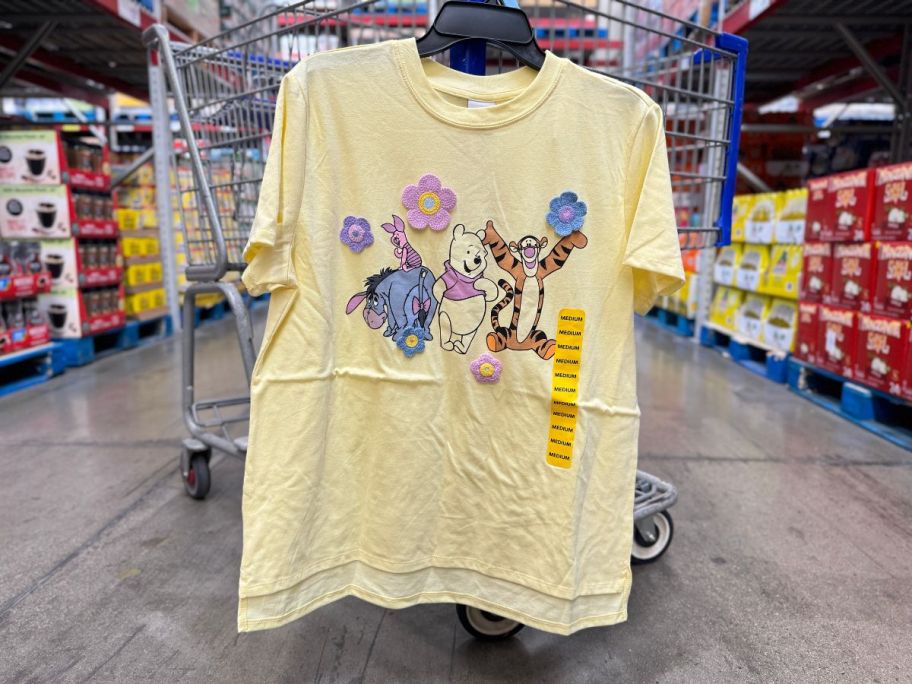 Ladies Crochet Character Tee - Pooh & Friends hanging on cart in store
