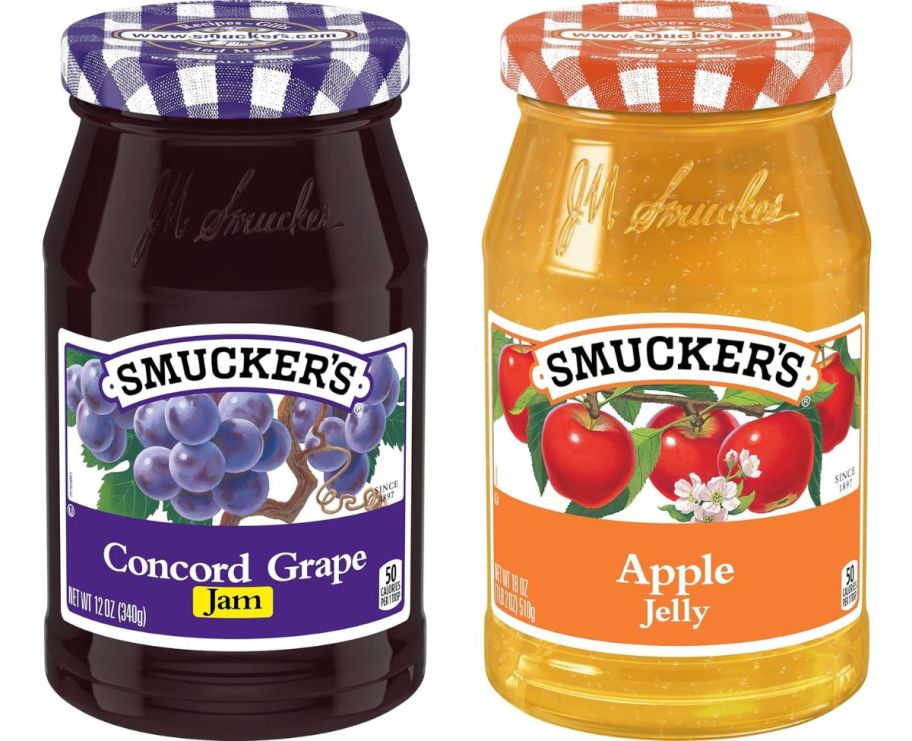 a jar of grape jam and a jar of apple jelly on a white background