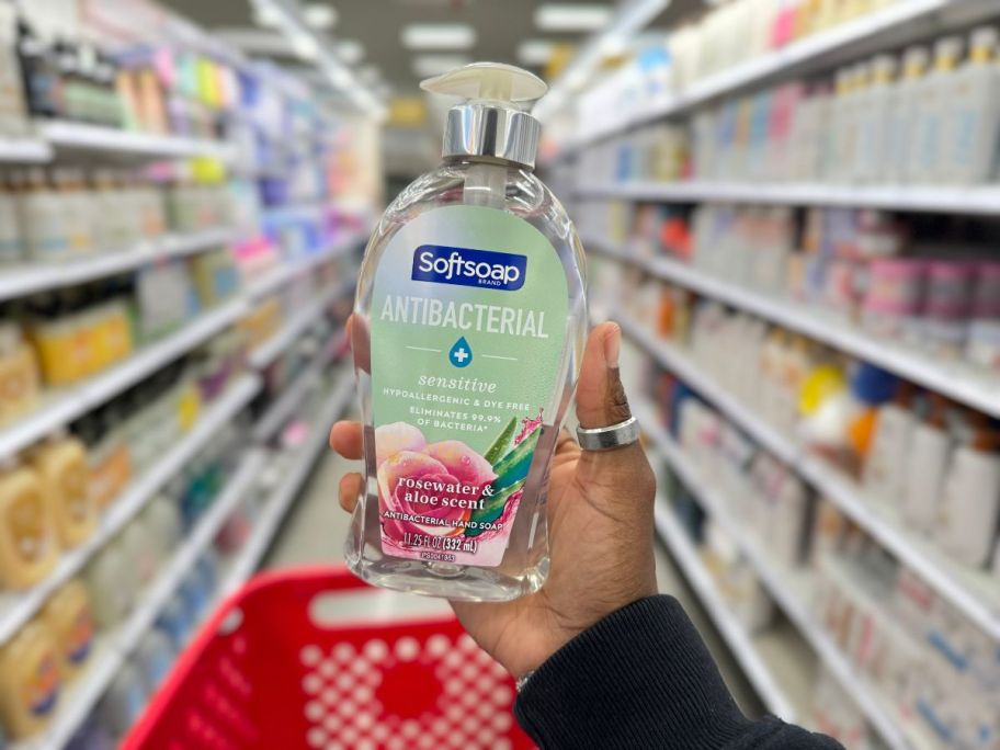 softsoap rosewater hand soap being held in a hand in target aisle