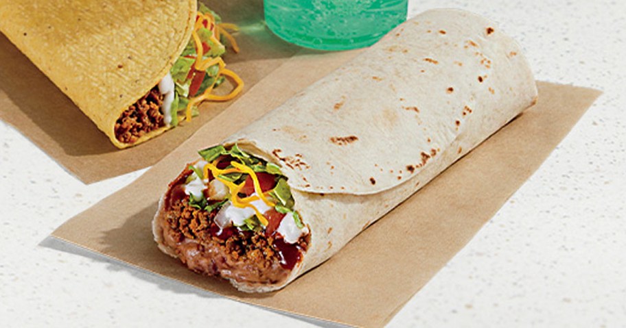 taco bel burrito supreme laying on napkin