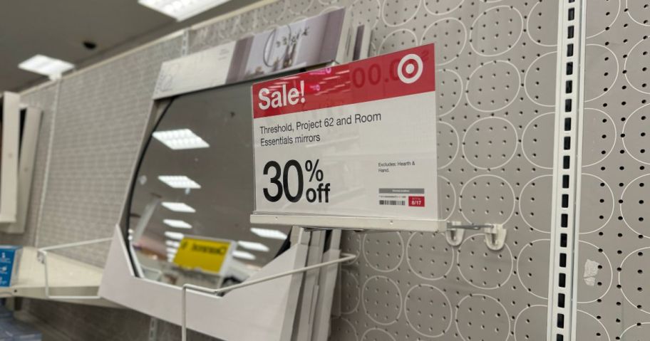 mirror sale sign in store