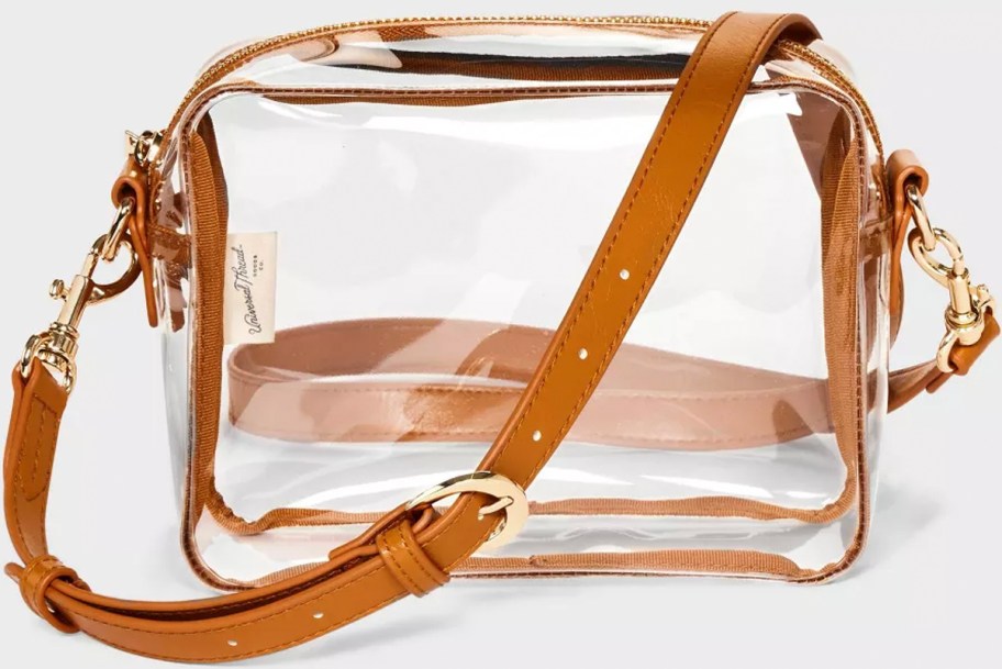 clear and brown leather bag stock image