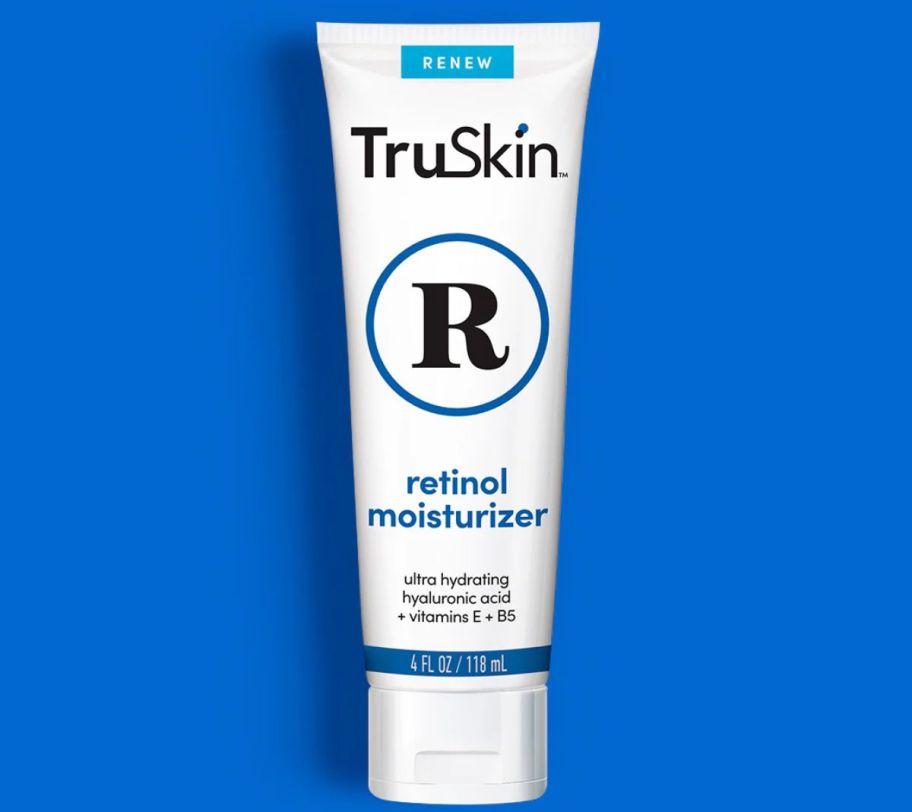a tube of truskin retinol moisturizer stock image on blue background 