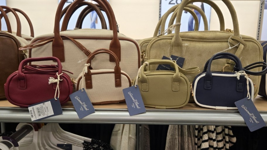 universal thread bag charm mini satchels on a store shelf