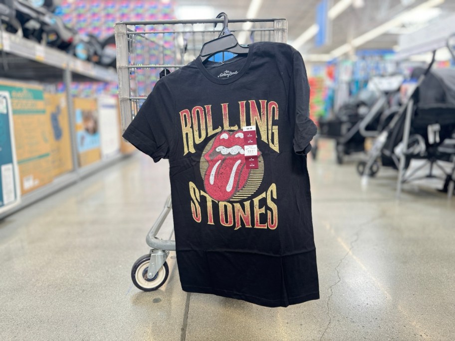 Rolling Stones logo graphic tshirt hanging on a Walmart Cart in store
