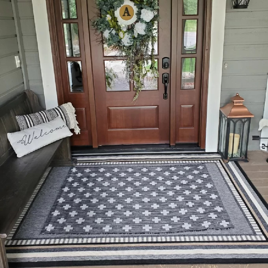 wayfair rug displayed in front of a house door