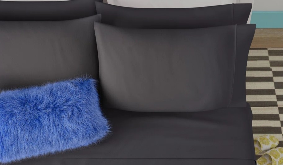 gray wayfair sheets on a bed