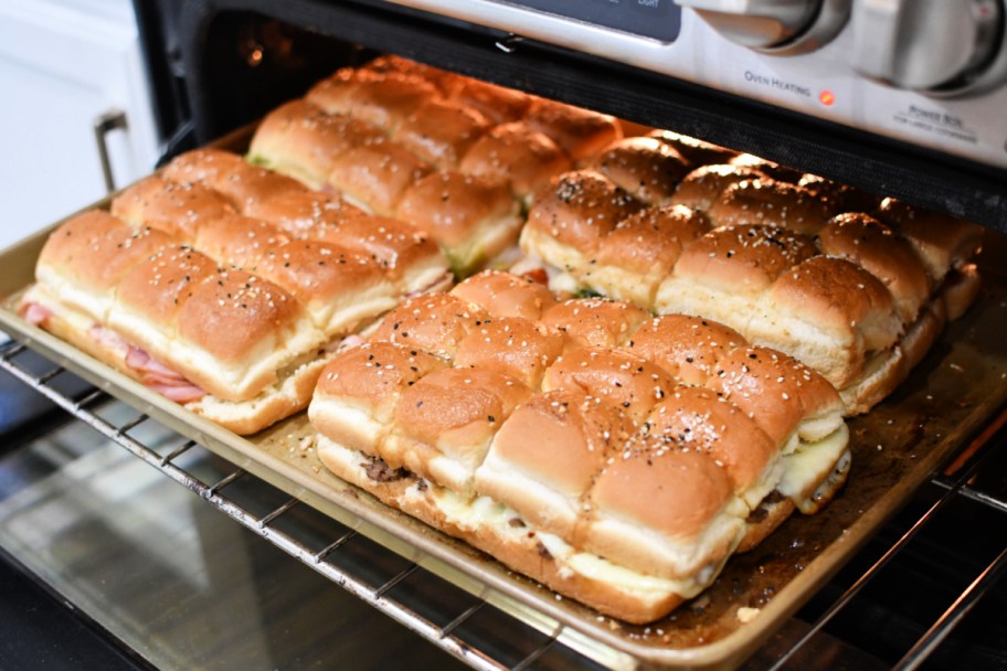 4 hawaiian roll sandwiches in the oven