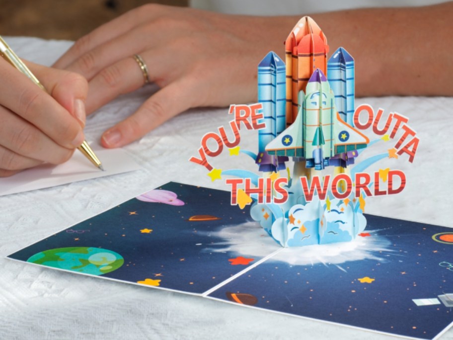 pop up Father's Day card with a rocket that says "you're outta this world"